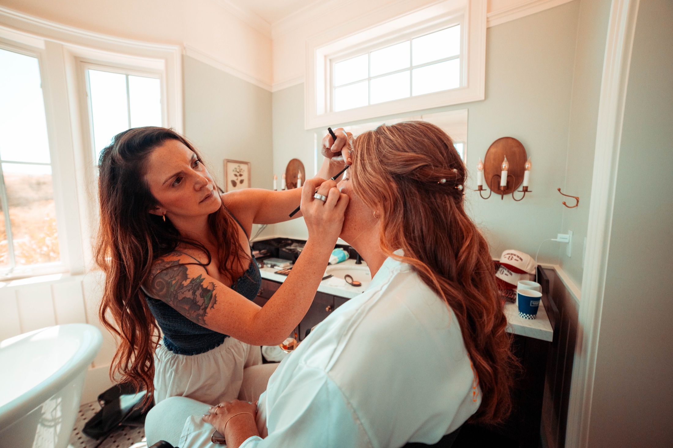 Karissa demonstrating precise eye makeup application