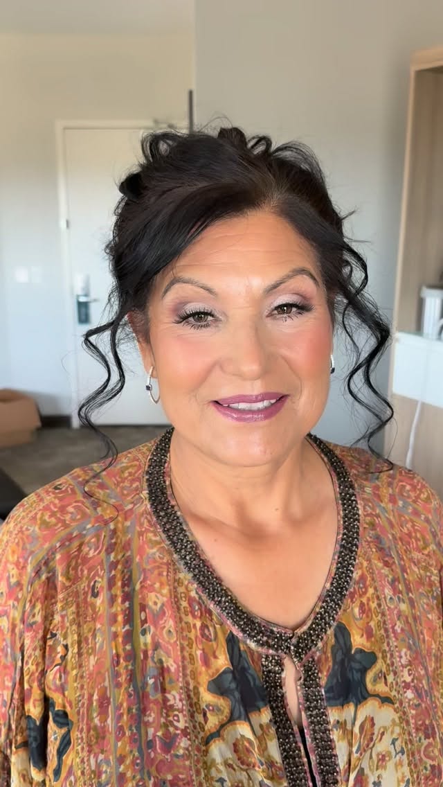 Client with luminous, softly defined makeup
